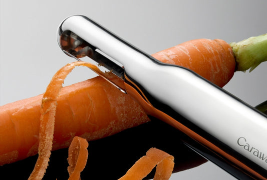 Vegetable Peeler - Premium stainless steel with a precise swivel blade for effortless peeling. - US 6400